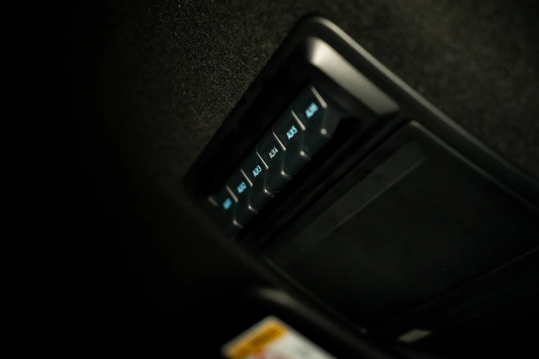 Backlit switch panel in a dark cabin